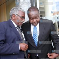 Education Cabinet Secretary Dr. Fred Matiang'i (right)