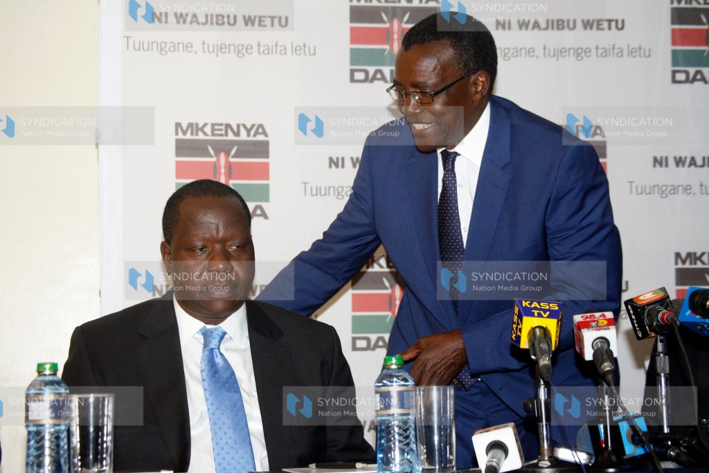 Acting Internal Security Cabinet Secretary Fred Matiang'i and Chief Justice David Maraga