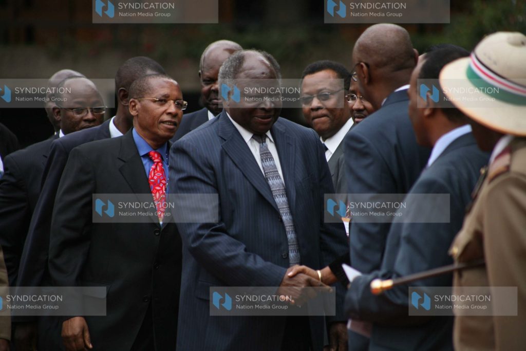 President Mwai Kibaki arrives for the opening of a National conference on Electoral Reforms
