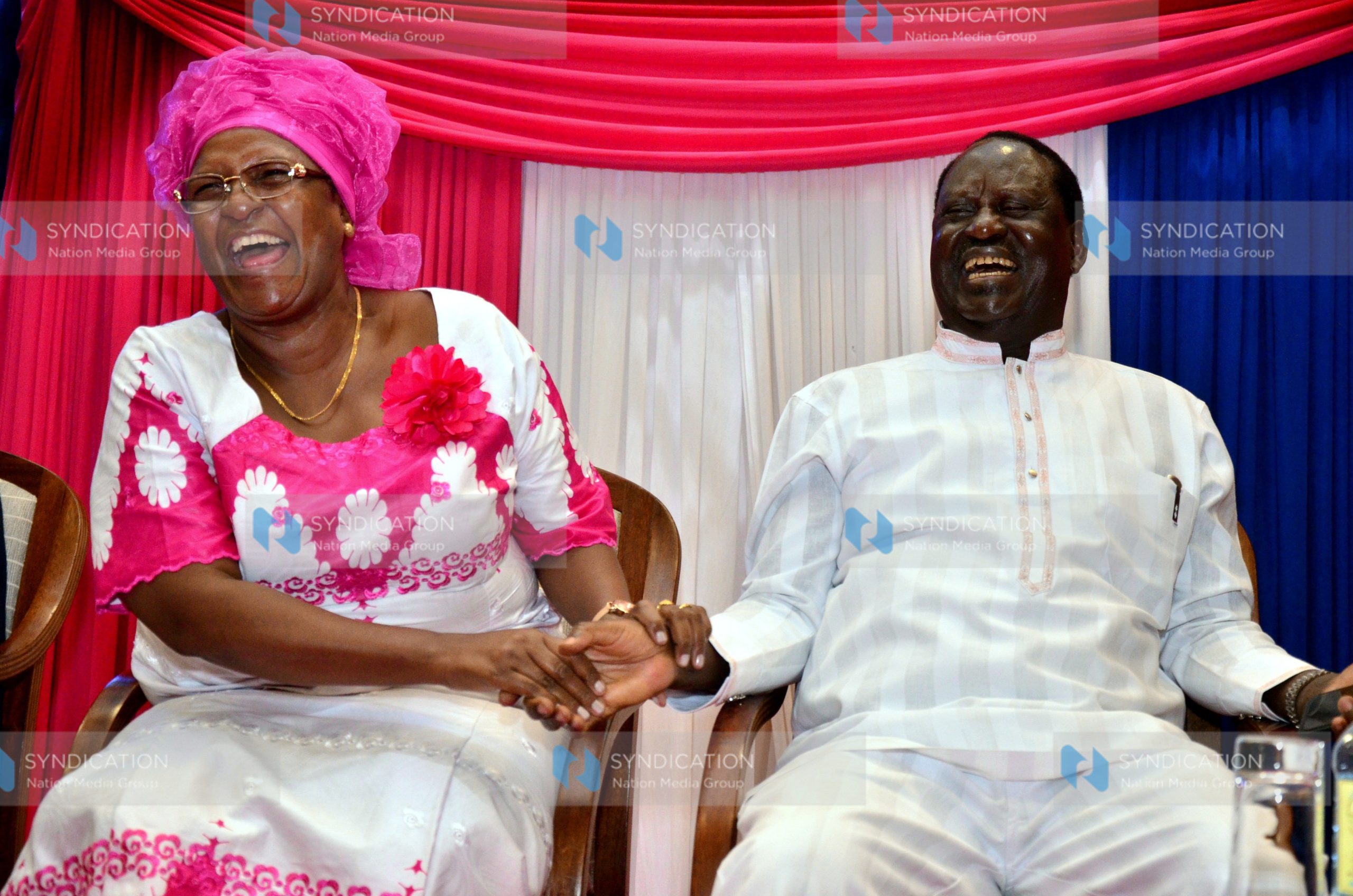 ormer Prime Minister Raila Odinga shares a light moment with Taveta MP Naomi Shaban