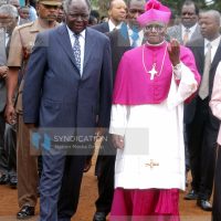 President Mwai Kibaki is welcomed by Embu catholic diocese Bishop Paul Kariuki