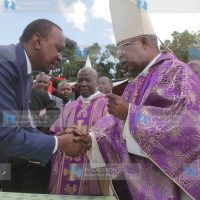President Uhuru Kenyatta has a word with Cardinal John Njue