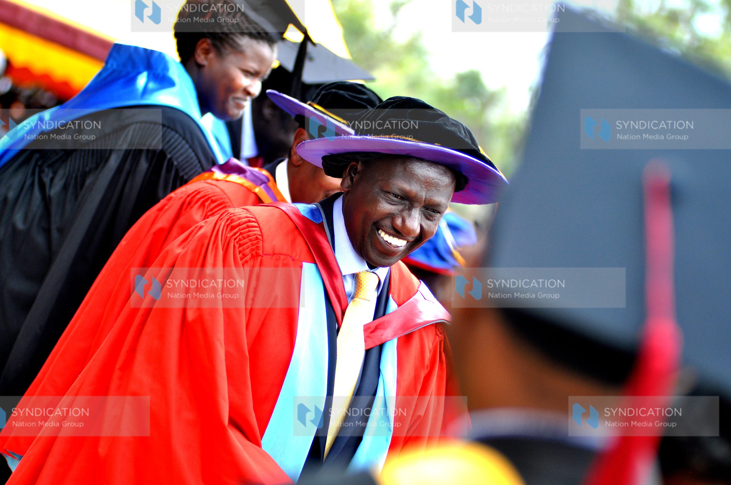 Deputy President William Ruto congratulates students