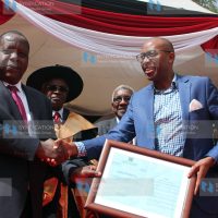 Education CS Fred Matiang'i, AMREF Group Chief Executive Officer Dr Githinji Gitahi