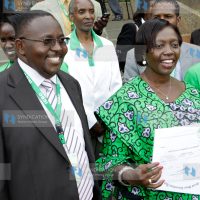 Narc-Kenya Martha Karua shows off her certificate after presenting her nomination papers to the IEBC