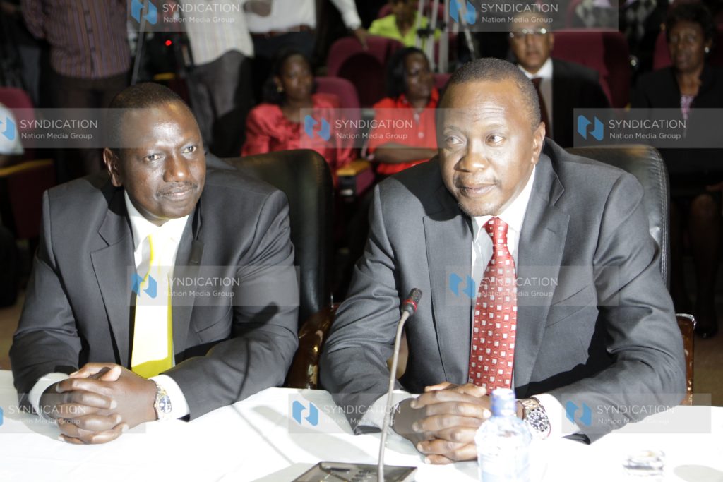 Uhuru Kenyatta with his running mate William Ruto during the IEBC nominations exercise