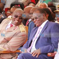 Meru Governor Kiraitu Murungi chats with County Commissioner Allan Machari