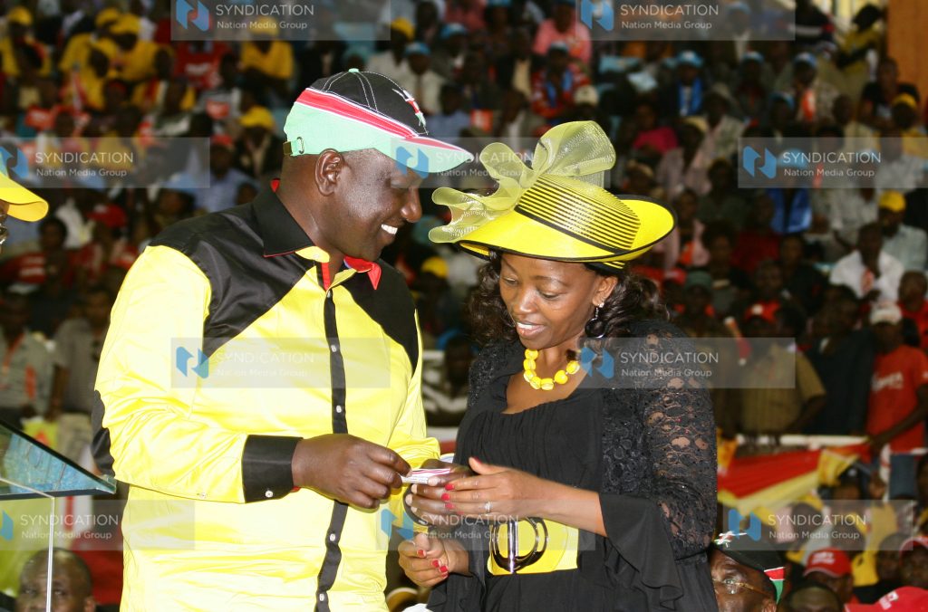 URP Leader William Ruto consulting with wife, Rachel Ruto