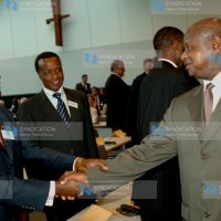 Kalonzo Musyoka shake hands with Presodent Yoweri Museveni