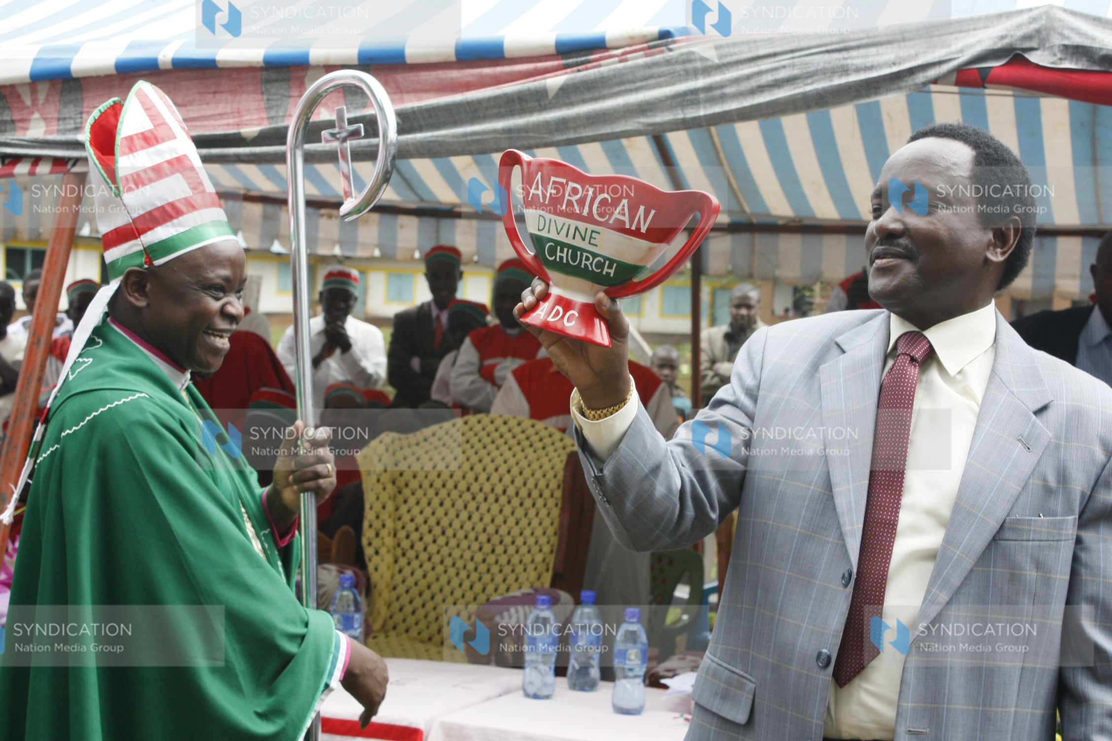 Vice president Kalonzo Musyoka admires an ADC gift