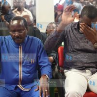 ODM Secretary General Edwin Sifuna raising their hands for prayers