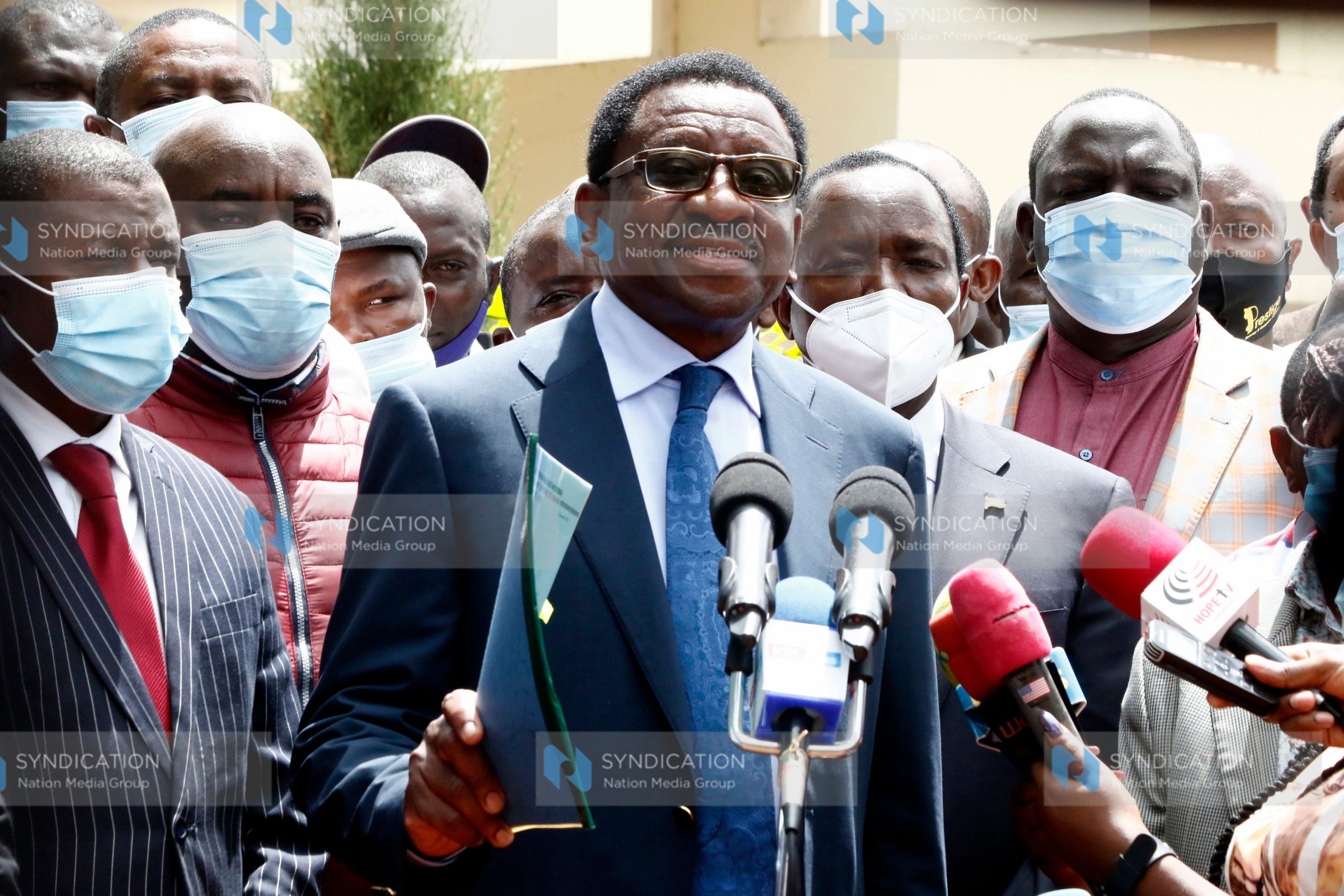 Siaya Senator James Orengo (left) briefs the media