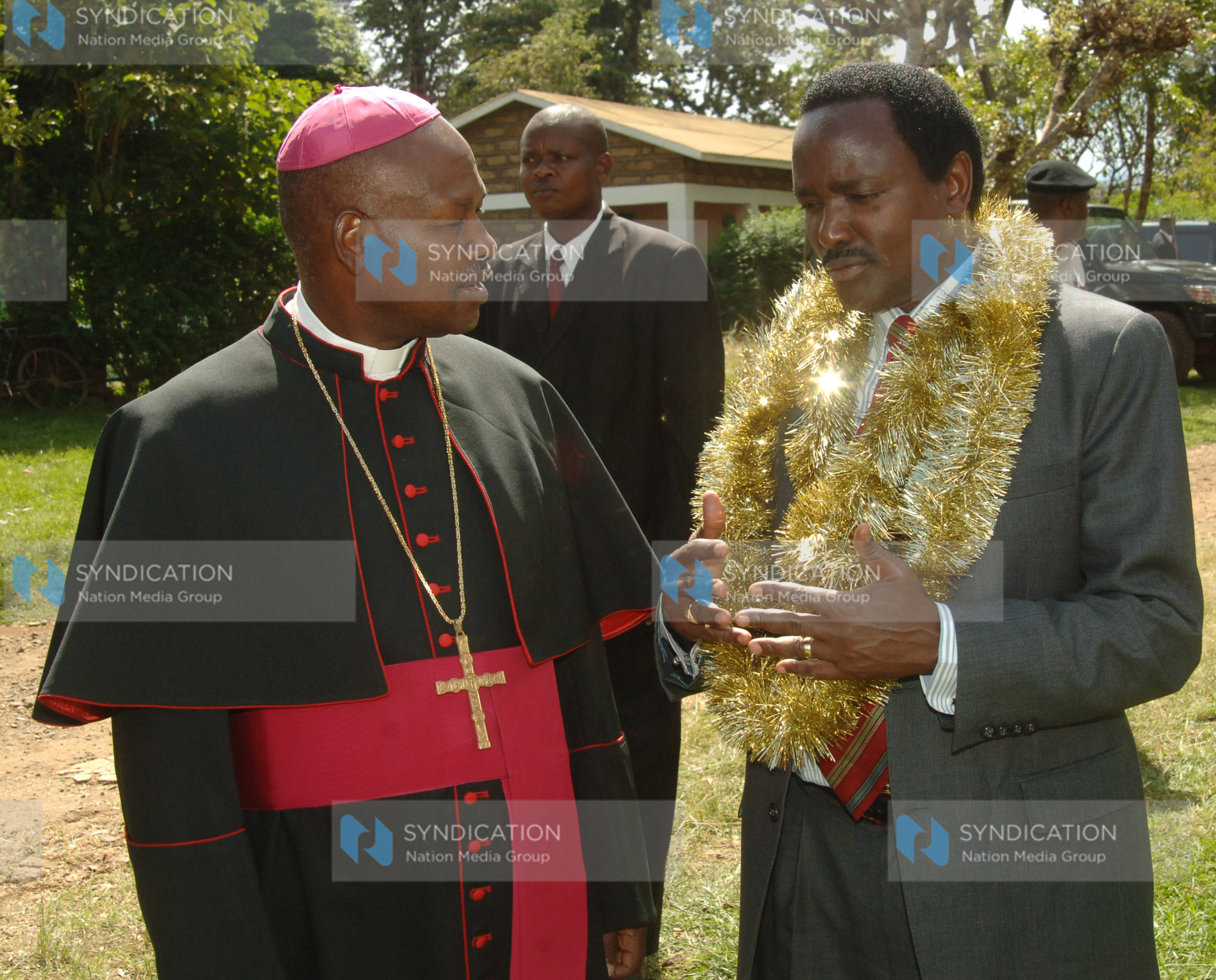 Vice President Kalonzo Musyoka converses with Bishop Salesius Mugambi