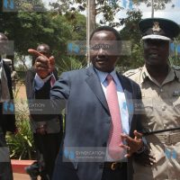 Vice president Kalonzo Musyoka talks to prison commandant Isaiah Osugo