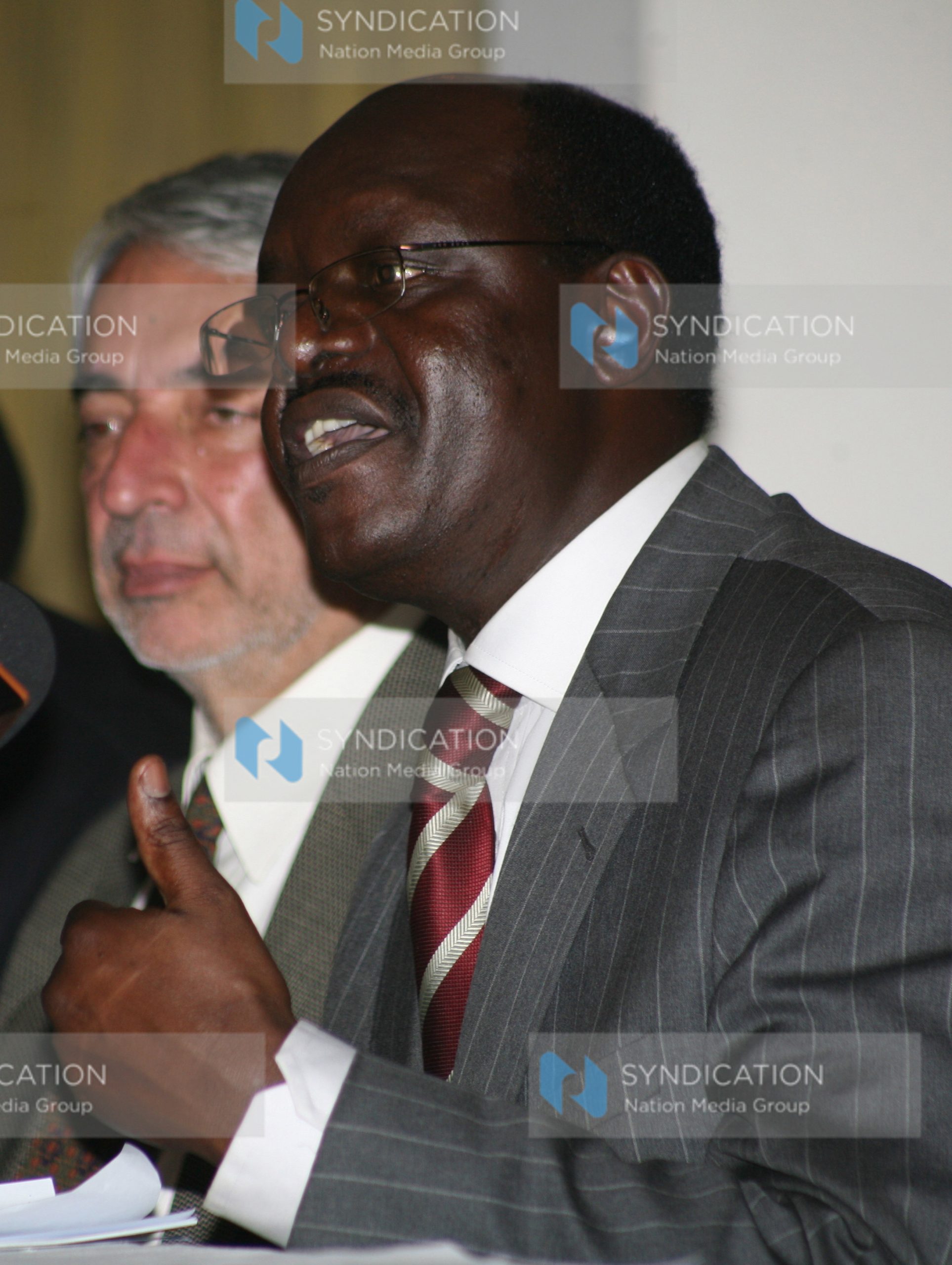 Former cabinet minister Mukhisa Kituyi (right)