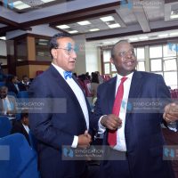 National Treasury Cabinet Secretary Henry Rotich (right)