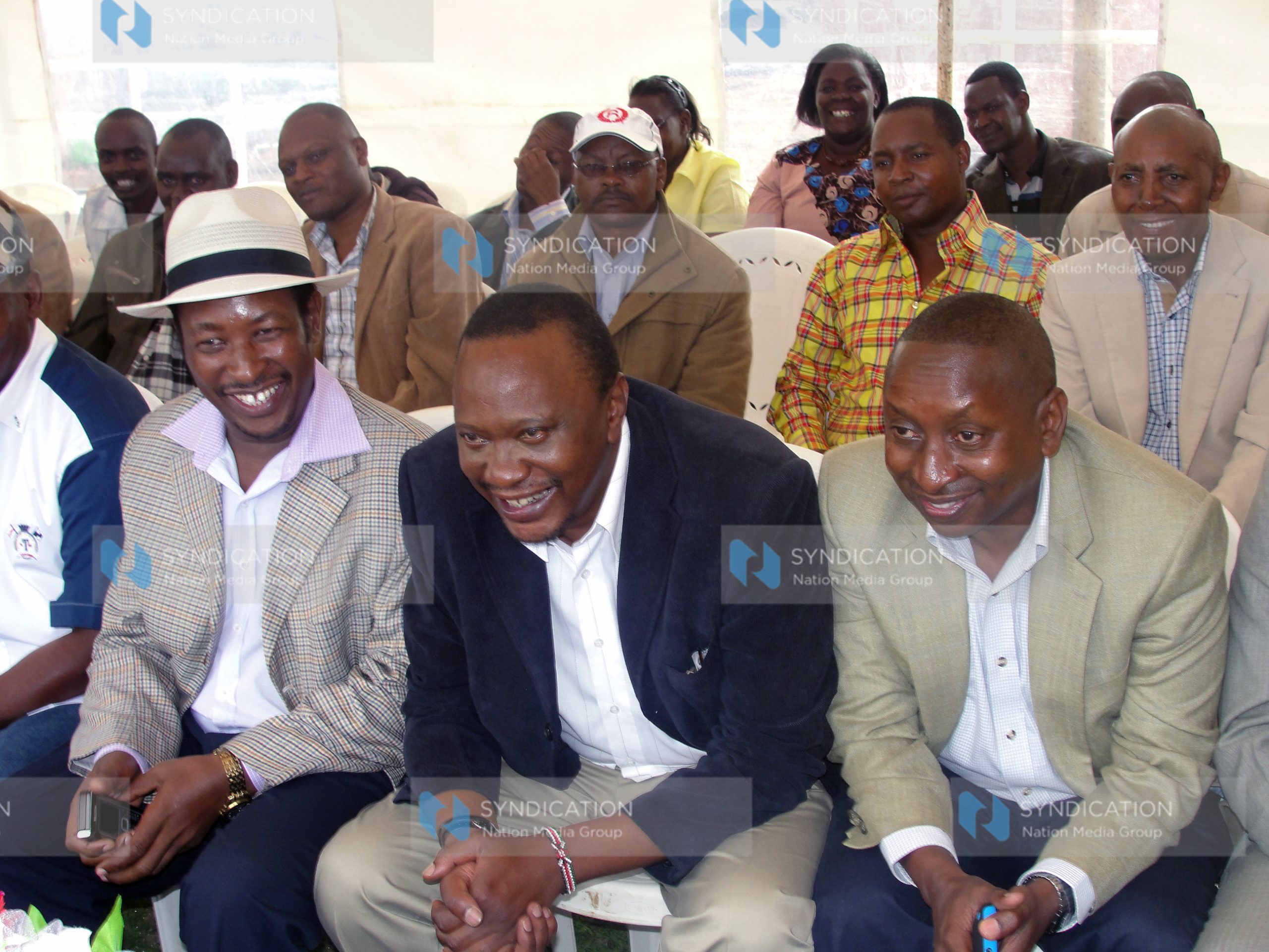 Uhuru Kenyatta with Limuru MP Peter Mwathi (left)