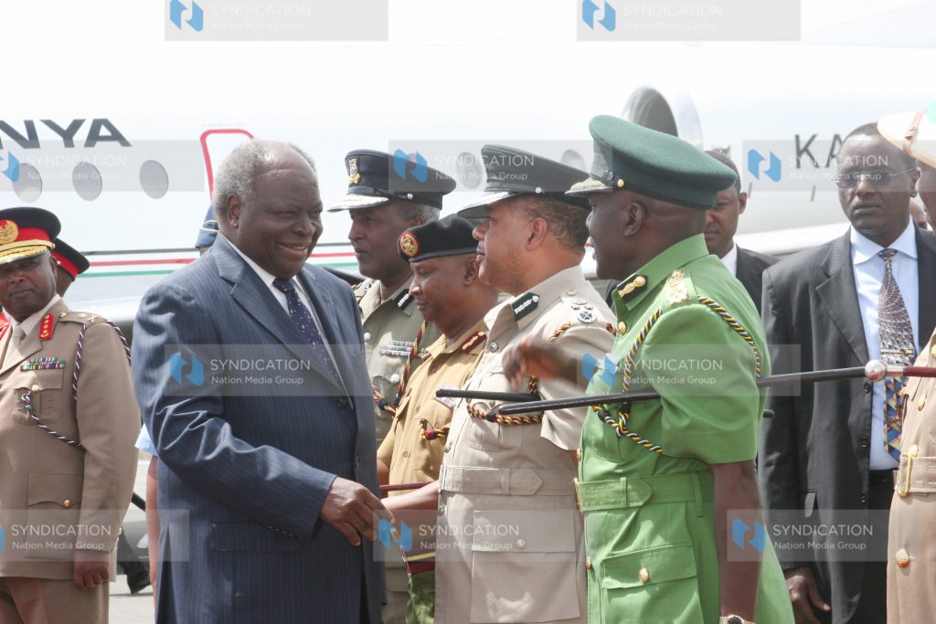 President Mwai Kibaki is welcomed by senior Army officers