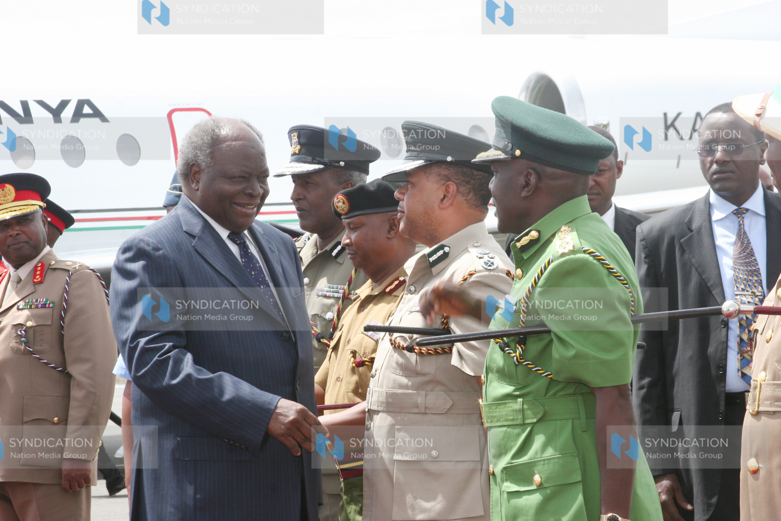 President Mwai Kibaki is welcomed by senior Army officers