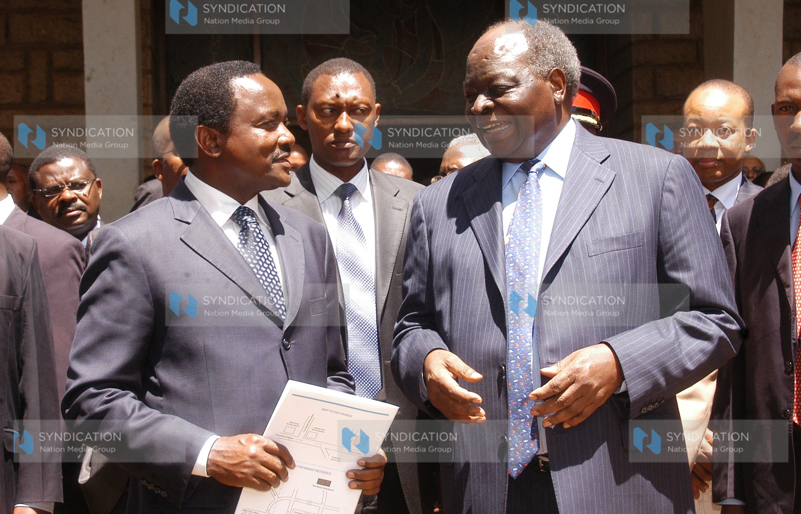 President Kibaki, right, chats with the Vice President Kalonzo Musyoka