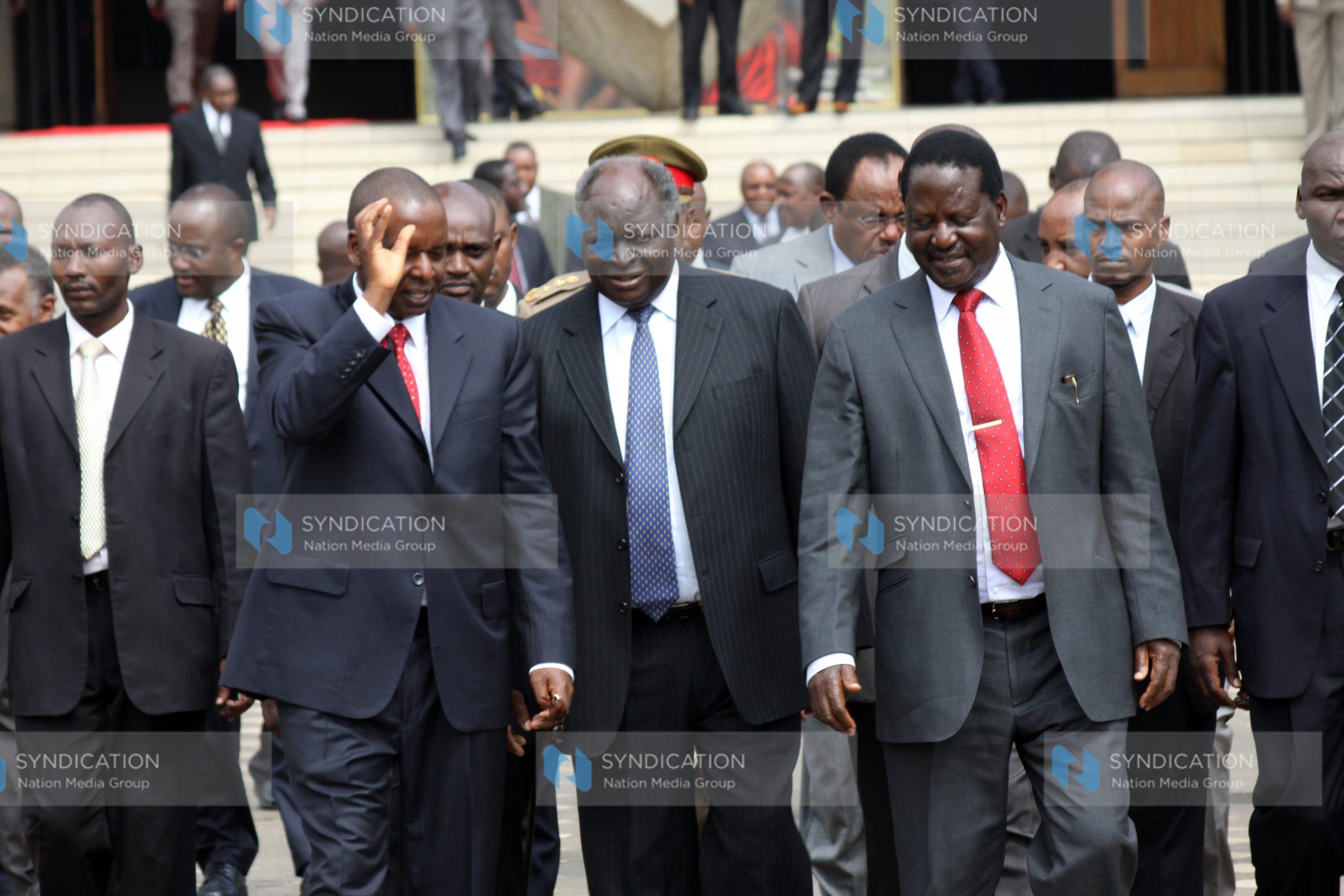 President Mwai Kibaki (center) with Prime Minister Raila Odinga