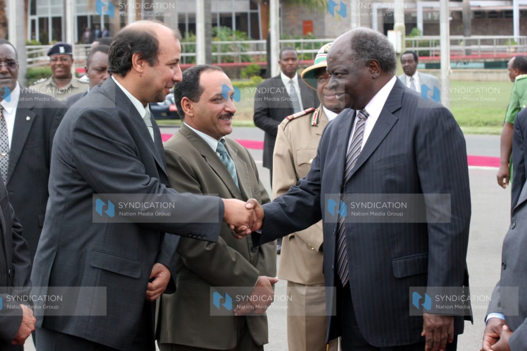 President Mwai Kibaki (right)