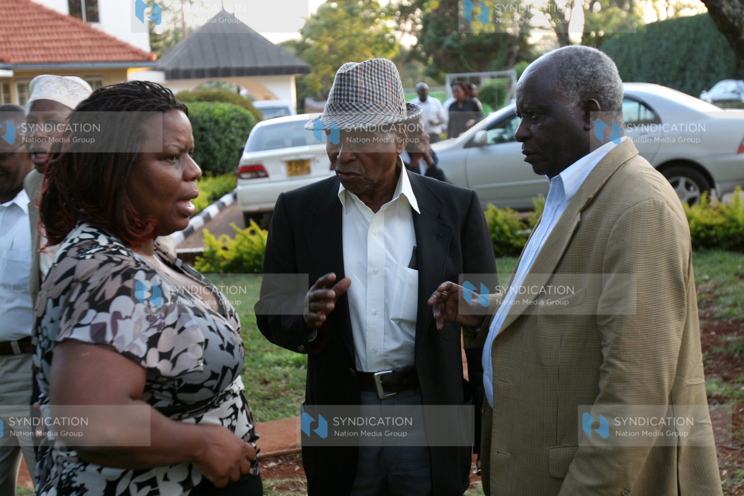 Joseph Kamotho (right) with Charles Rubia and Anne Kirima during a press briefing