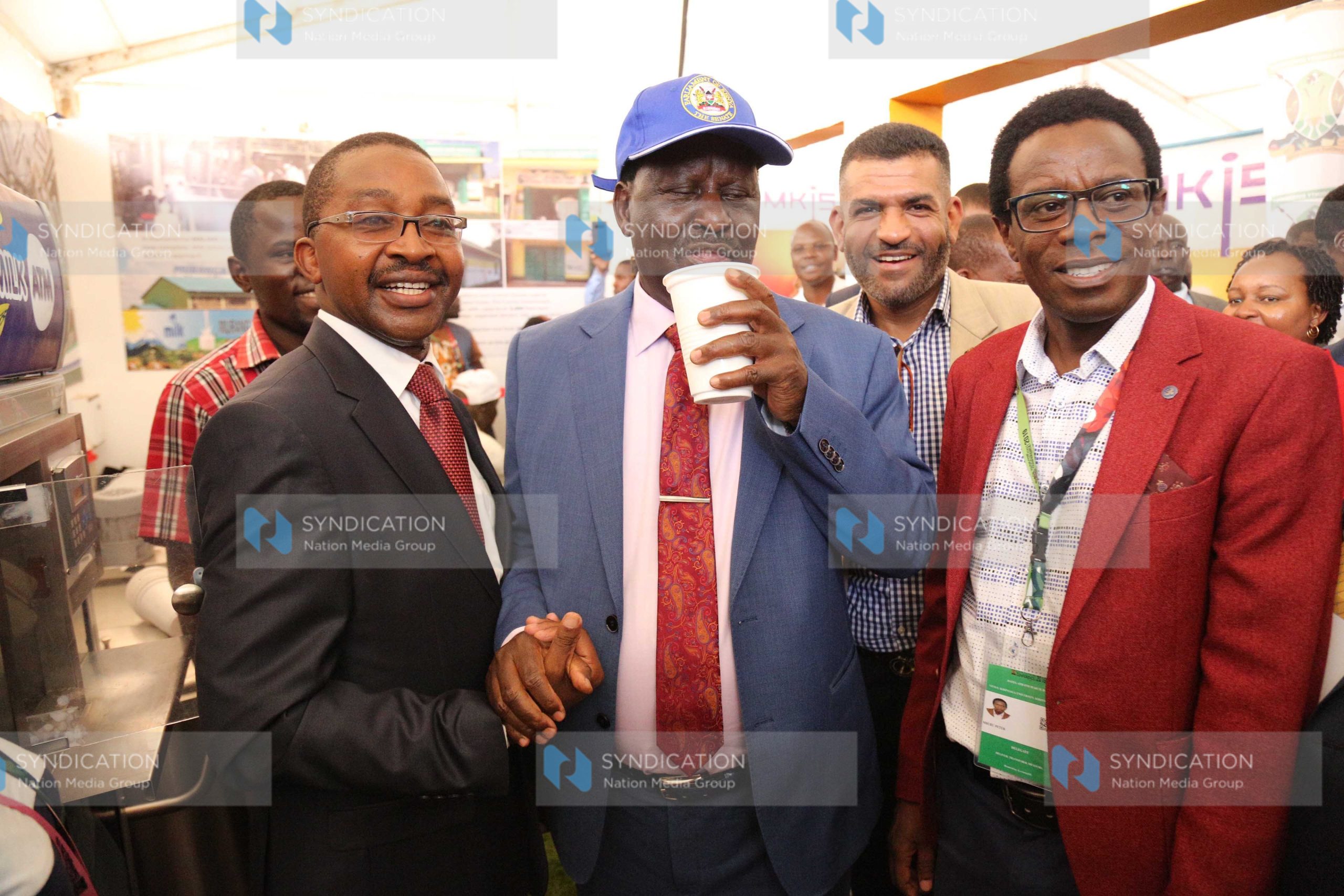 Raila Odinga tastes milk at the Murang’a County exhibitions