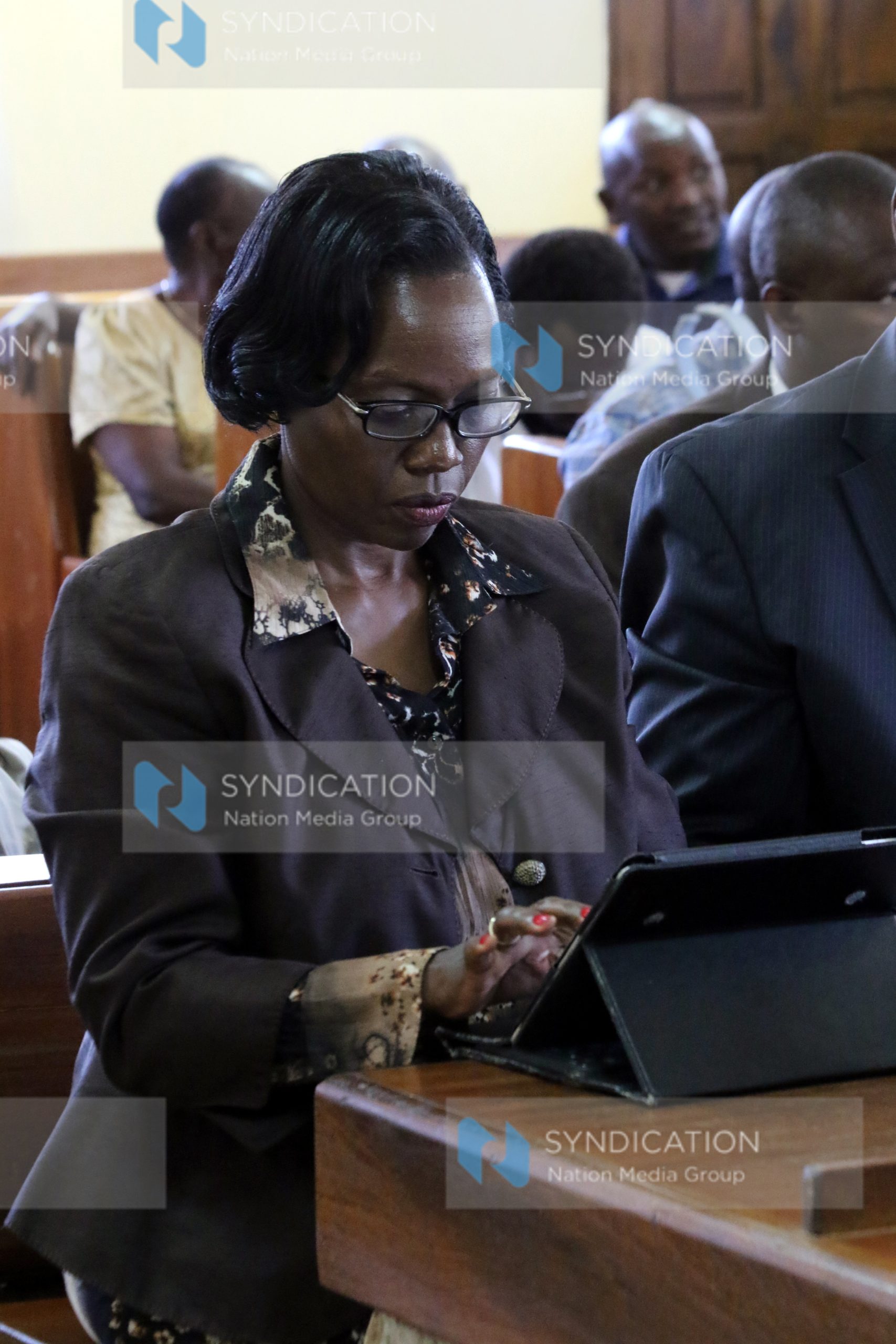 Martha Karua follows proceedings during a hearing of a petition