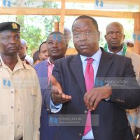 Interior CS Fred Matiang'i consulting with Nyamira County Commissioner