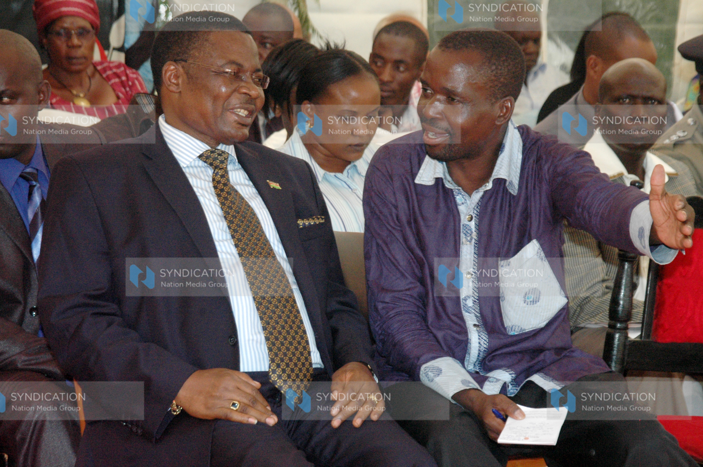 Kenneth Marende (left) attends the burial of his late mother, Ms. Dorcas Chek Gumbo