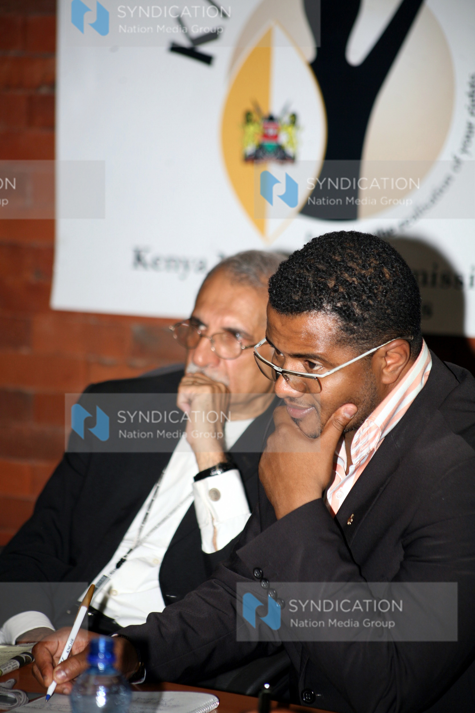 Hassan Omar and Lawyer Pheroze Nowrejee(left) at a media briefing