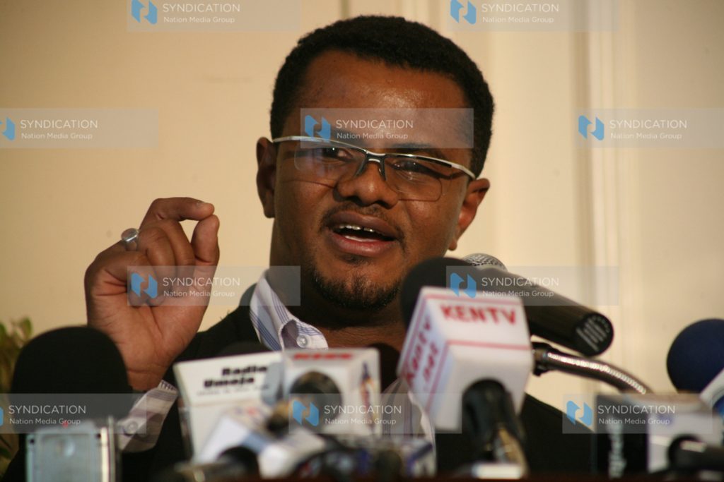 Human Rights commissioner Hassan Omar addresses journalists
