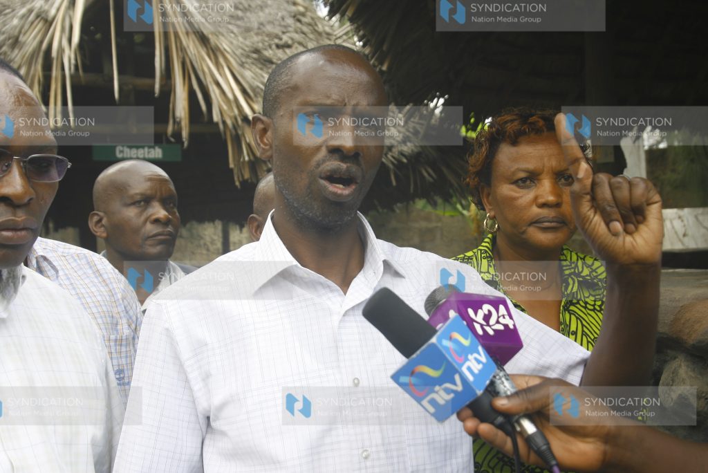 Wilson Sossion (C) and other KNUT union officials addressing the Media