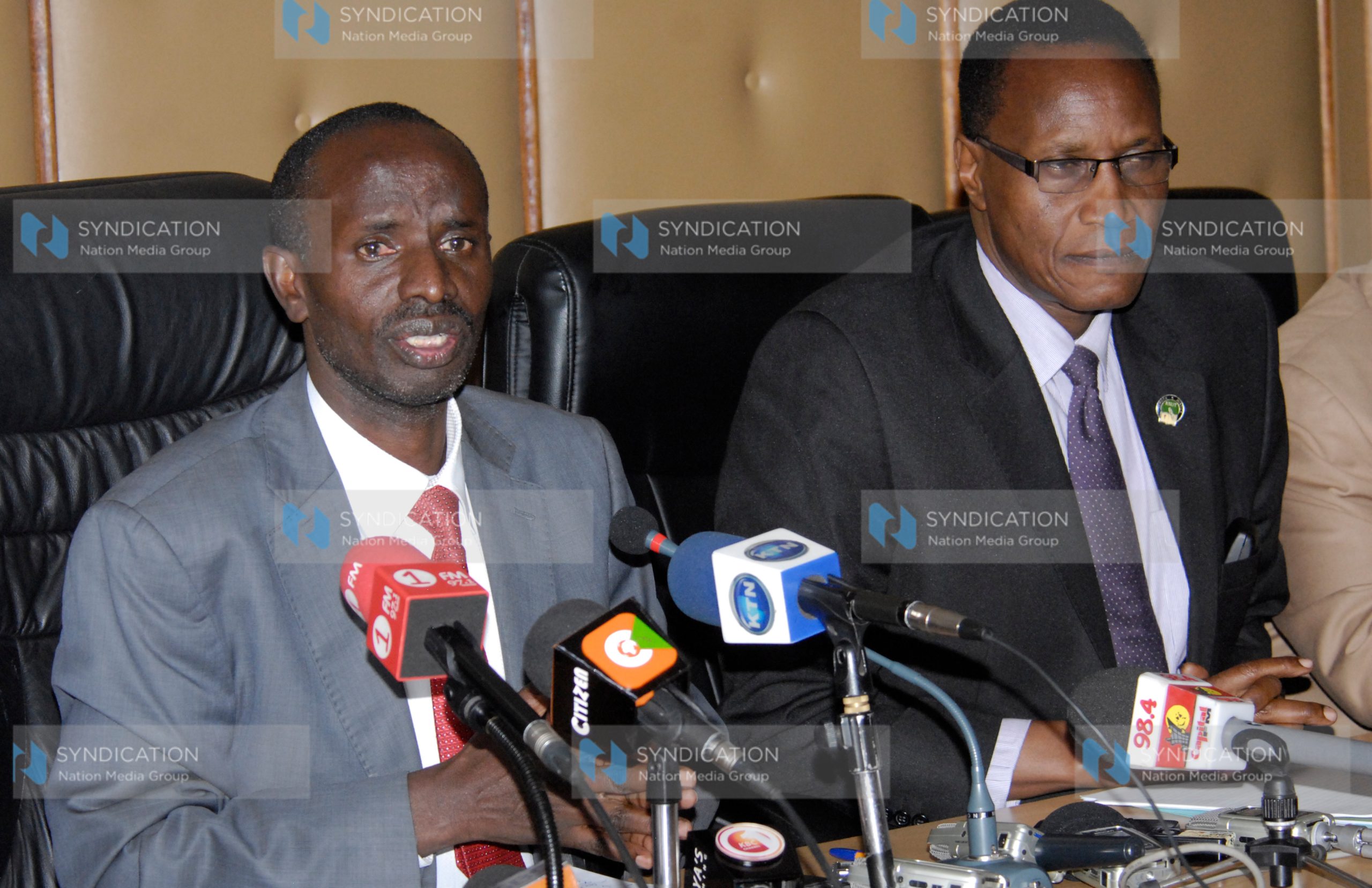 Wilson Sossion (Left) flanked by Education Cabinet Secretary Jacob Kaimenyi