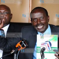 Wycliffe Omucheyi (left) Secretary General Wilson Sossion addressing the media