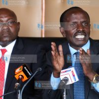 Wycliffe Omucheyi (left) Secretary General Wilson Sossion addressing the media