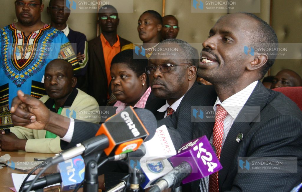 (KNUT) Chairman Wilson Sossion (right) speaking to the press