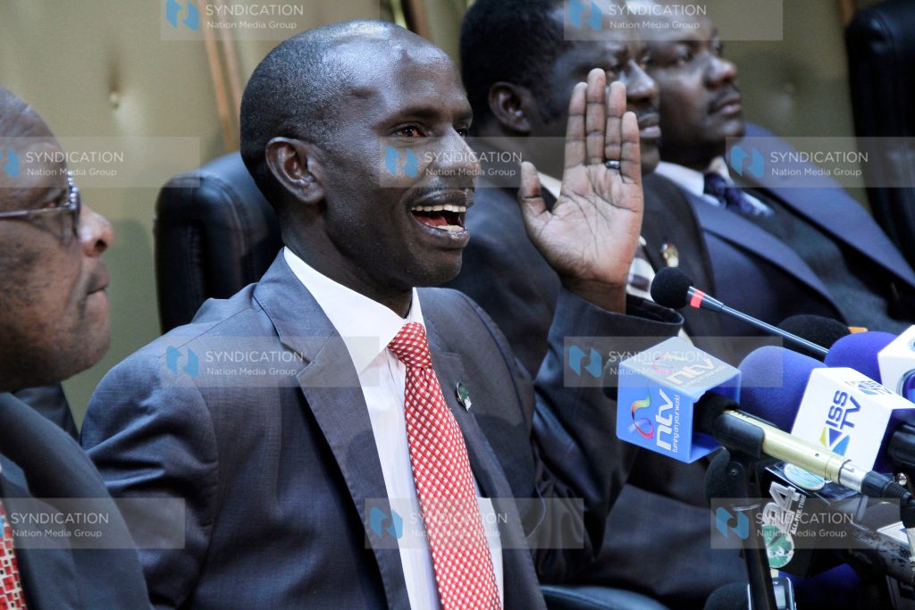 KNUT chairman Wilson Sossion (center) spoke during a press briefing