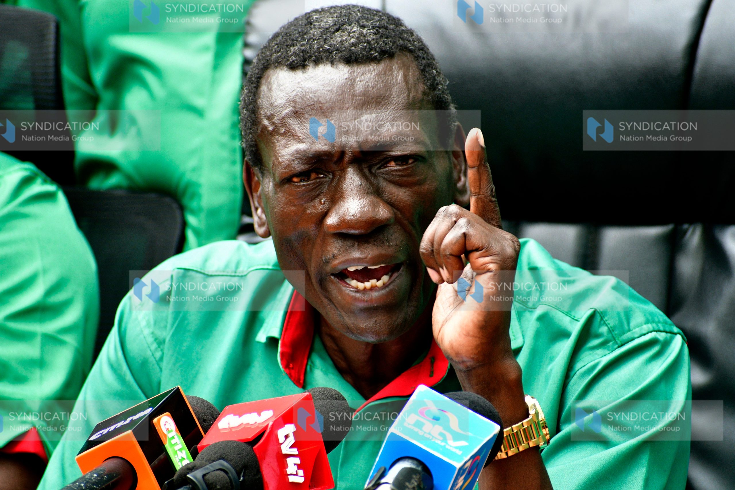(KNUT) Secretary General Collins Oyuu gestures during a media briefing