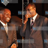 Transport minister, Amos Kimunya (left) and Kenya Airways CEO