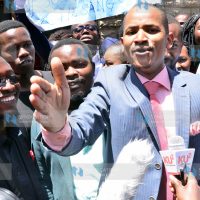 Babu Owino (left) addressing students of Kenyatta University School of Law