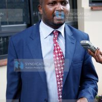 PNU activist Moses Kuria speaks to journalists