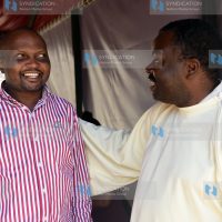 Moses Kuria talking to Catholic Priest Evaristus Ekwem