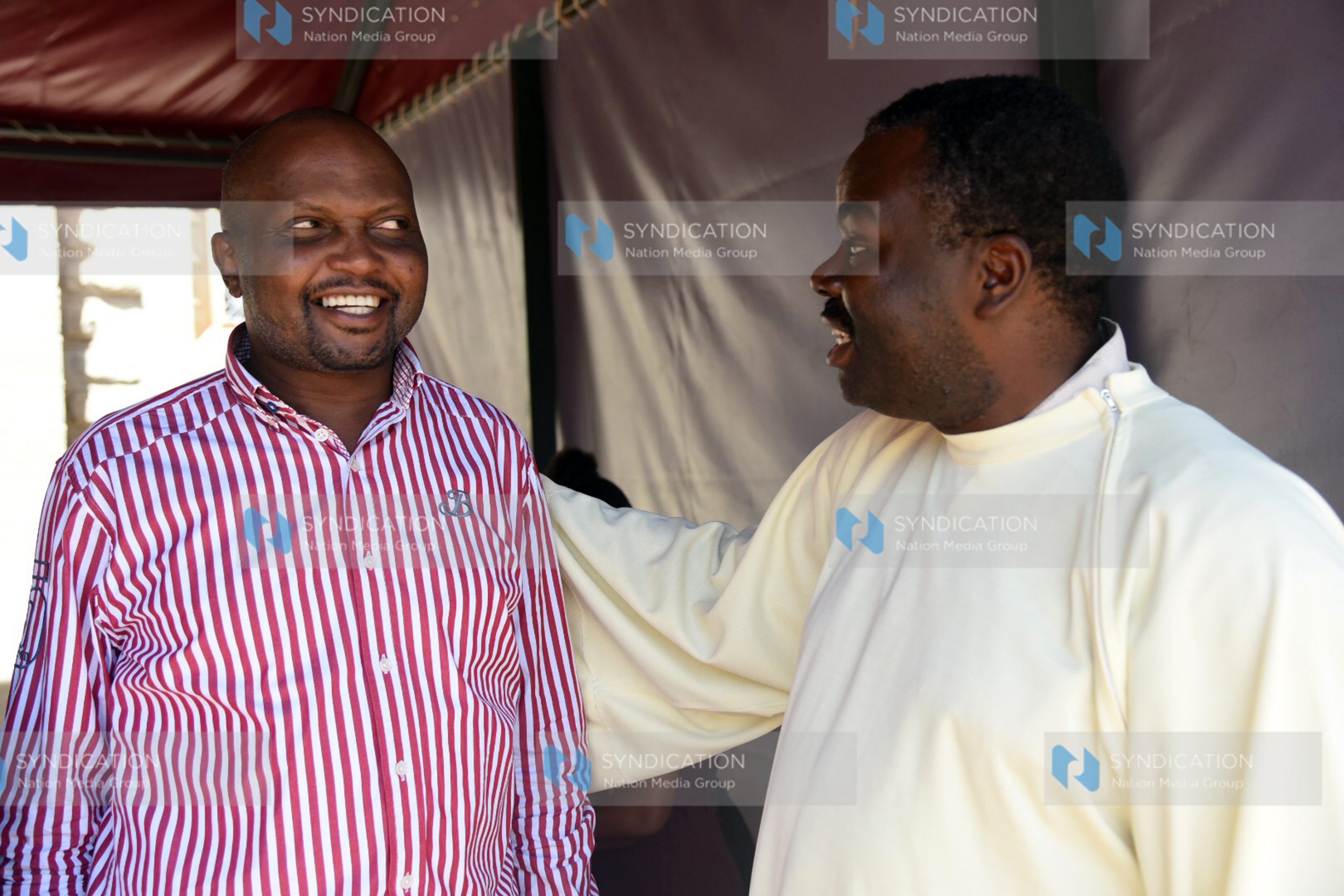 Moses Kuria talking to Catholic Priest Evaristus Ekwem