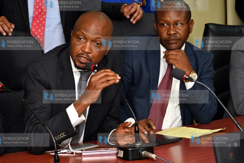 Gatundu South MP Moses Kuria (left) makes his remarks
