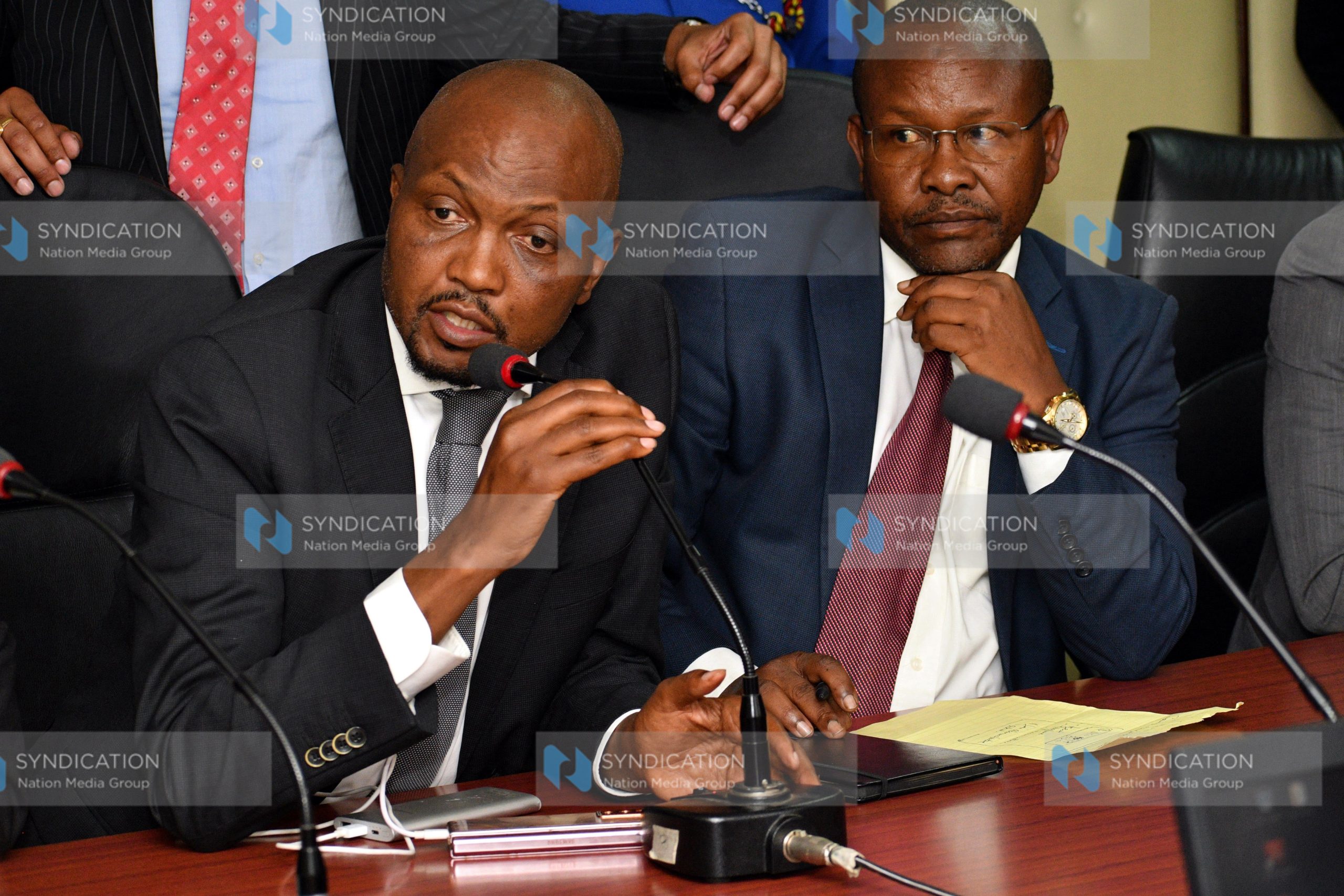 Gatundu South MP Moses Kuria (left) makes his remarks