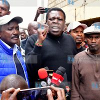 (DAP-K) Party Leader Eugene Wamalwa (center) briefs media