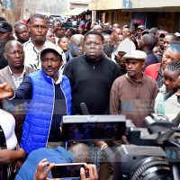 Wiper Party Leader Kalonzo Musyoka (left) briefs media
