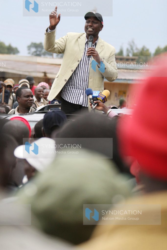 Eldoret North MP William Ruto addresses a rally at Flax in Keiyo South